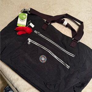 Kipling Black Duffel Bag with Silver Zippers